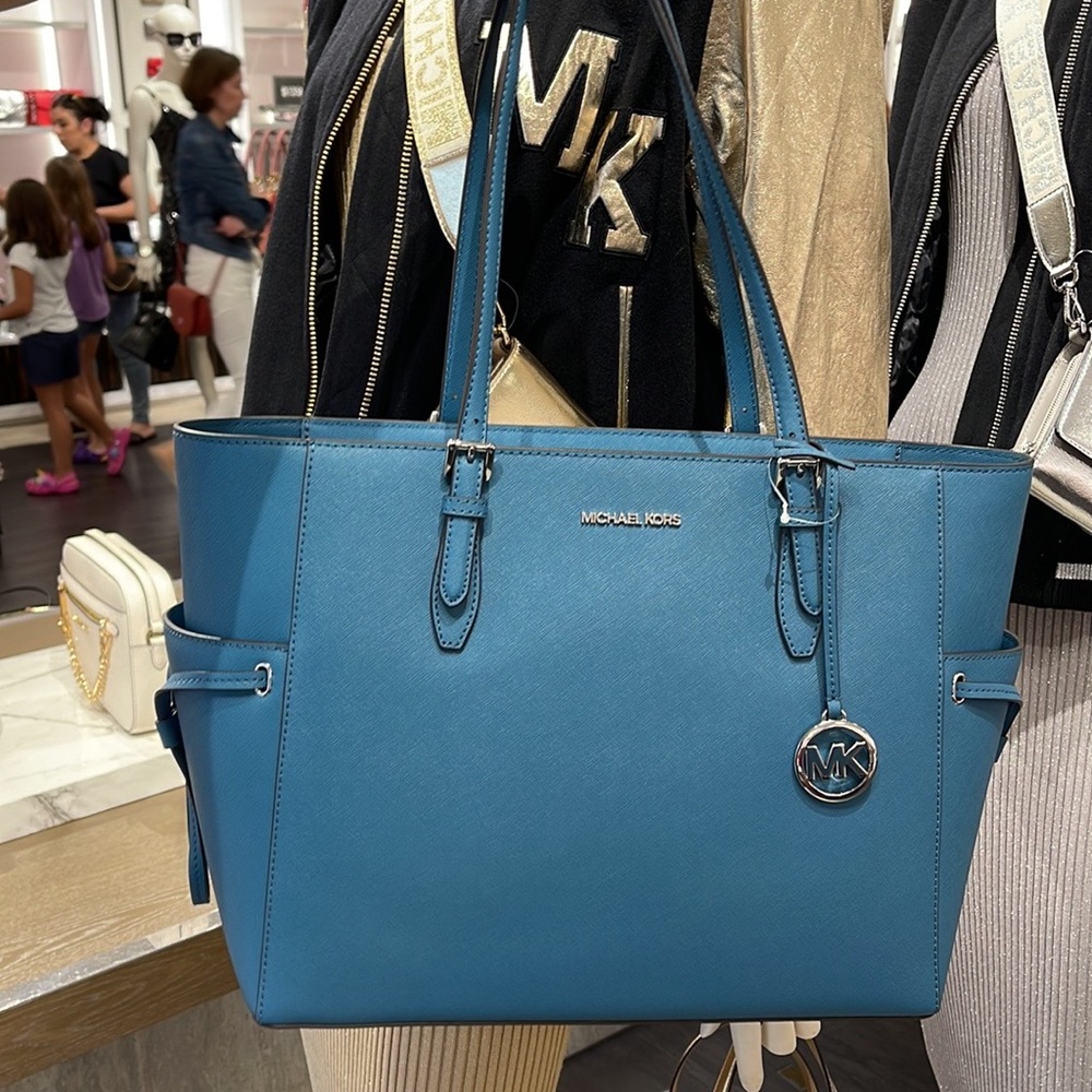 Michael Kors Gilly Large Drawstring Travel Leather Top Zip Tote
 Color: TEAL
NWT - Picture 2 of 16